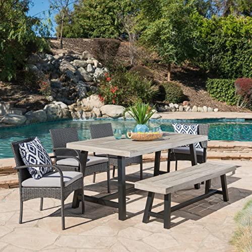 Christopher Knight Home Louise Outdoor Wicker Dining Set with Acacia Wood Table and Bench and Water Resistant Cushions, 6-Pcs Set, Sandblast Light Grey / Black Rustic Metal / Grey / Grey Cushions