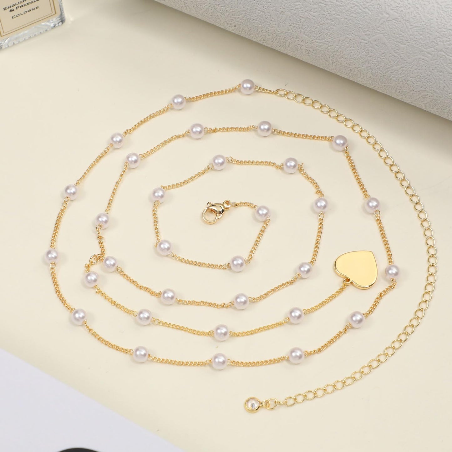 Rotnso 14K Gold Plated Body Chains Dainty Boho Layered Beach Waist Pearl Bead Chain Adjustable Bikini Belly Chain Jewelry Accessories for Women Sexy