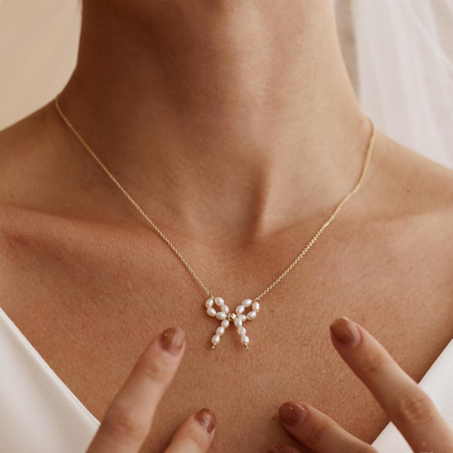 Caenyo Dainty Pearl Bow Pendant Necklace for Everyday Wear, 14K Gold Plated, Lightweight & Tarnish Resistant, Elegant Jewelry for Women