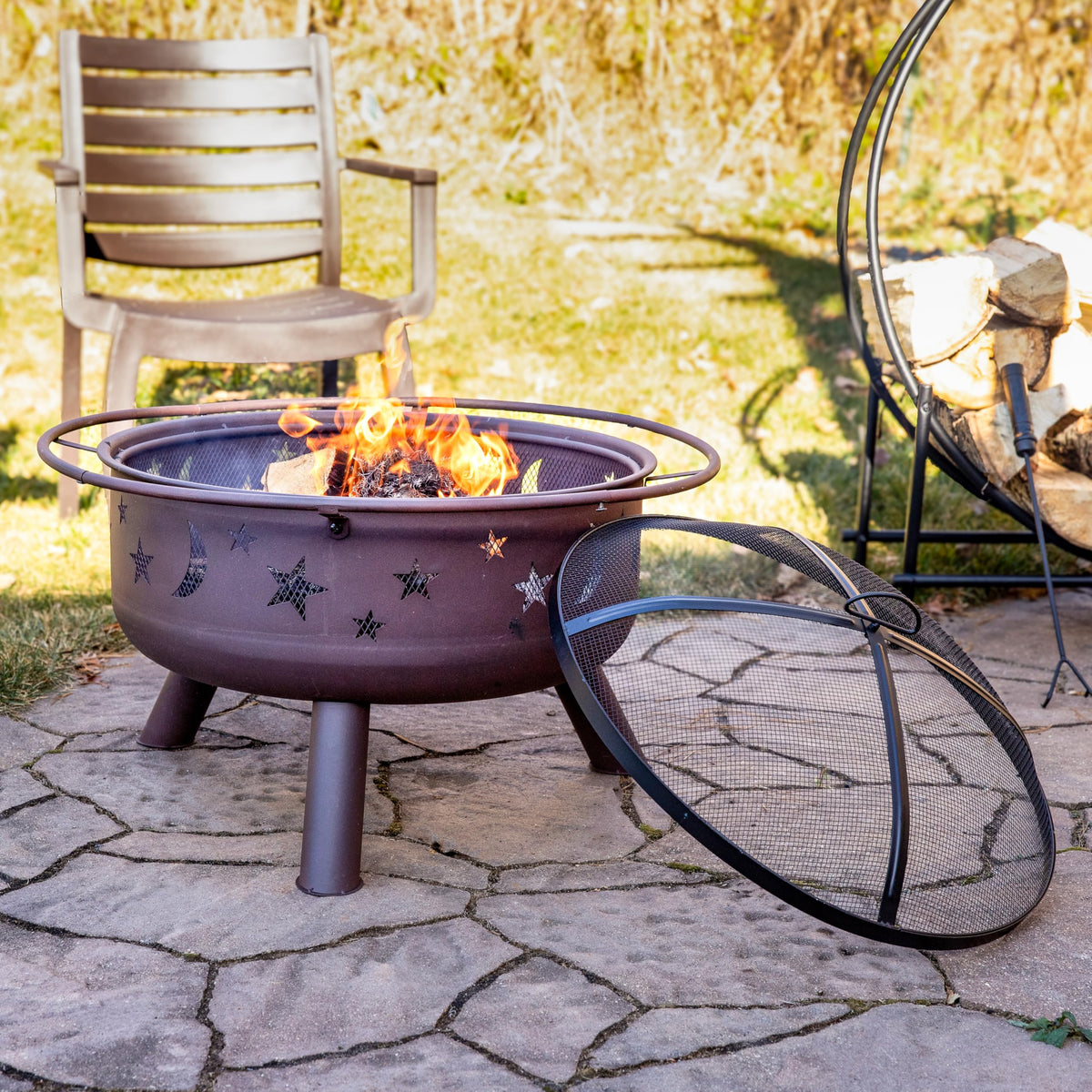 Sunnydaze Cosmic 30-Inch Outdoor Fire Pit - Wood Burning Fire Pit with Cooking BBQ Grill Grate, Spark Screen, and Fireplace Poker - Celestial Design